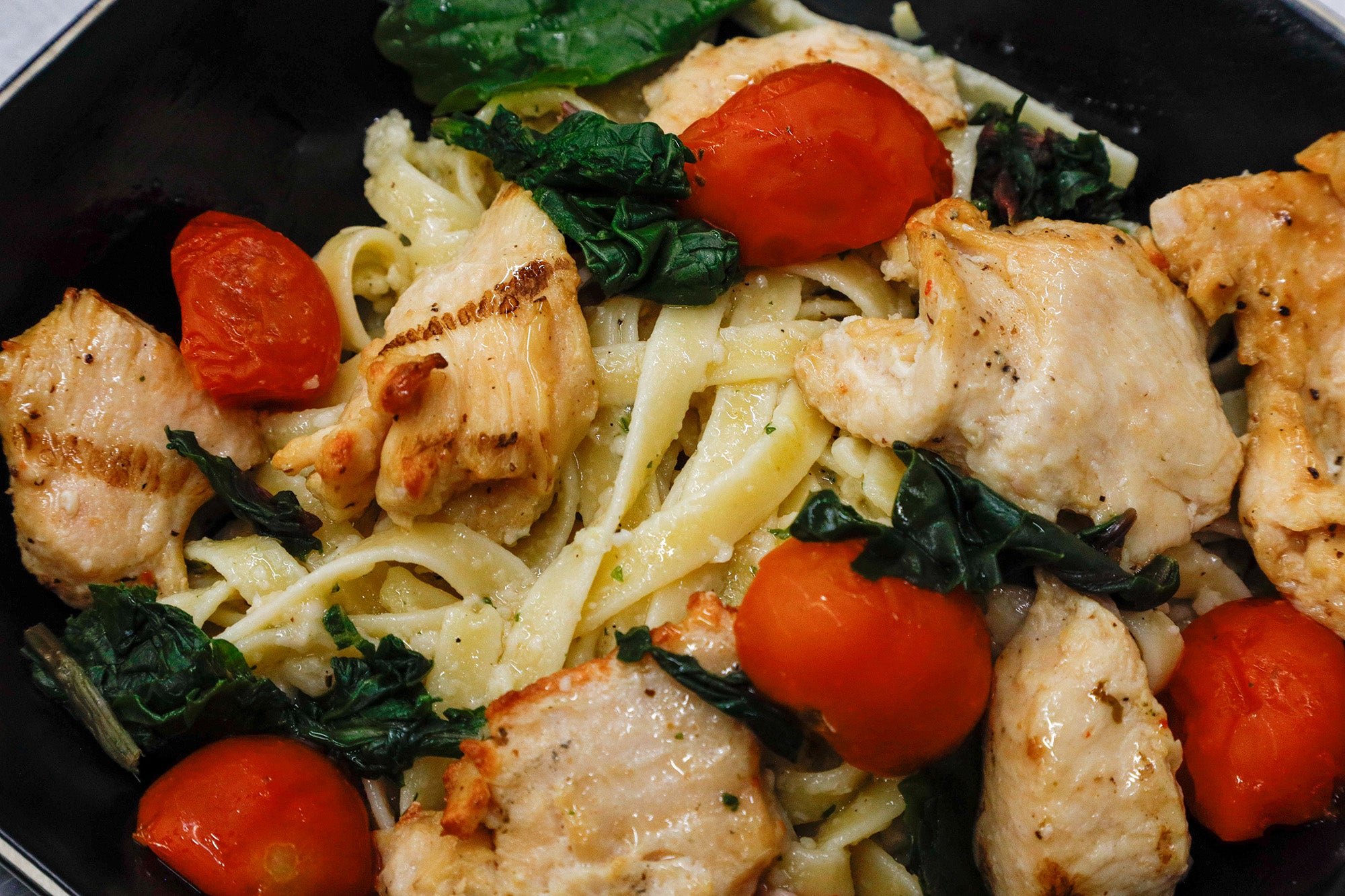Savor the Flavor: Herculean’s Garlic Chicken  Fettuccine- Your May Must-Try!
